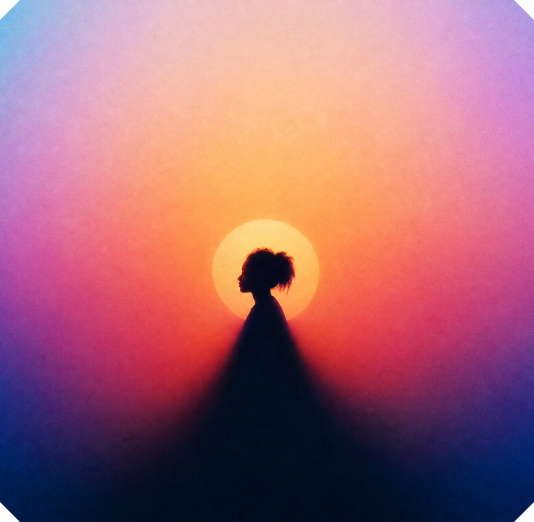 Abstract silhouette of a person against a glowing sun and colourful gradient.